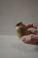 Tiny rustic vase