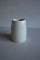 Reclaimed glass sludge vessel