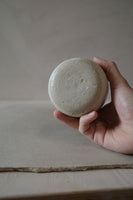 Warm white sculptural cup