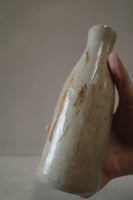 Large rust decorated bottle/vase