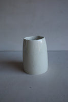 Reclaimed glass sludge vessel