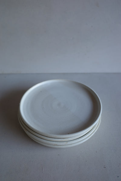 Set of four cake plates