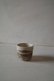 Very small warm white foraged clay cup