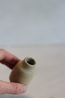 Tiny tan vase