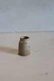 Tiny patina vase