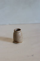 Tiny patina vase
