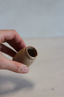 Tiny patina vase